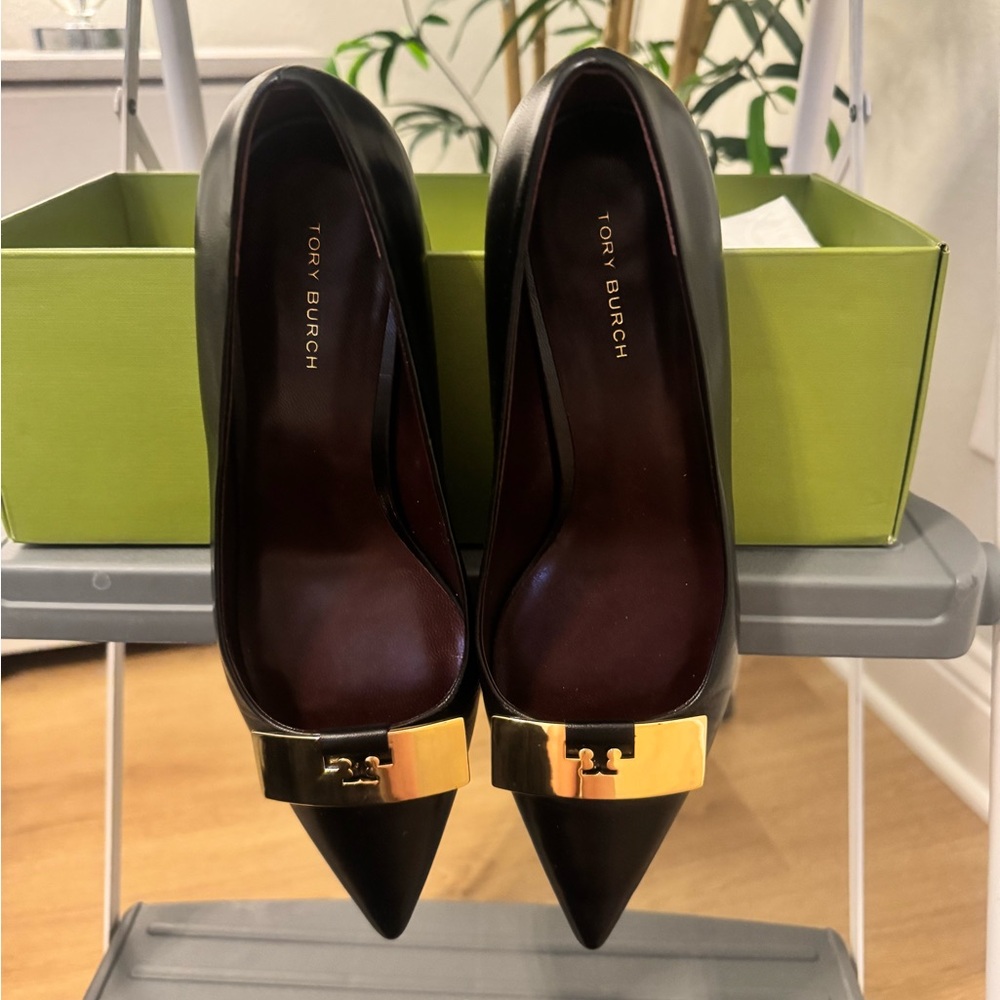 Tory Burch Black Leather Pointed Toe Pumps with Gold Plaque
